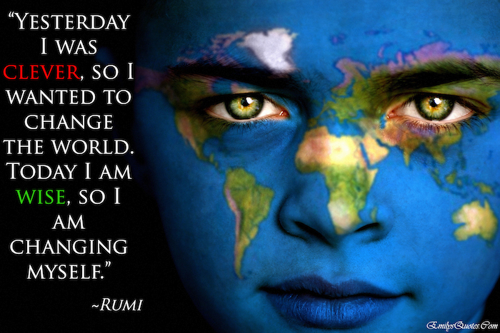 Portrait of a boy with the map of the world painted on his face.